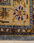 Handcrafted Oushak Blue Hand Knotted Rug, showcasing its intricate floral medallions and subtle abrash variations in soft blues and creams, adding a touch of timeless elegance to a warmly lit room.
