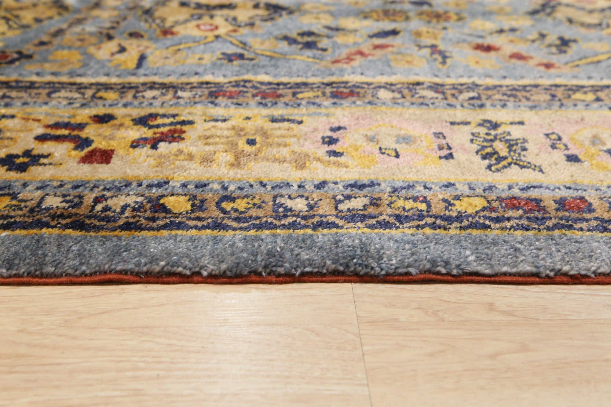 Handcrafted Oushak Blue Hand Knotted Rug, a symphony of blues in a traditional Oushak pattern, masterfully hand-knotted, offering timeless elegance and artisanal craftsmanship.
