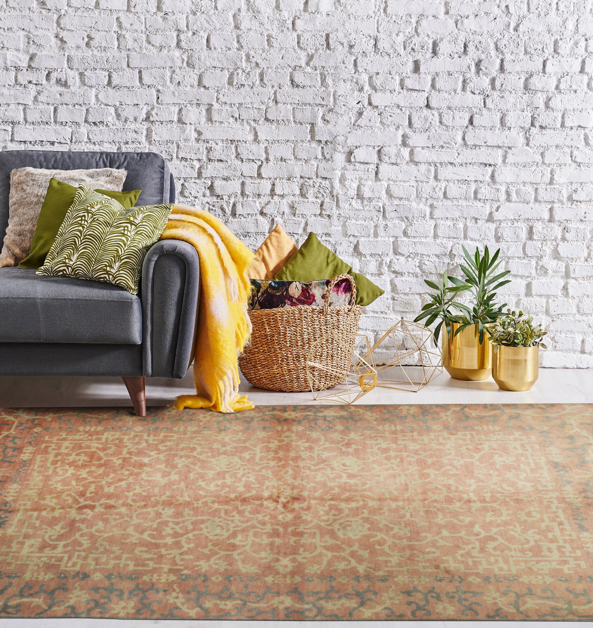 Lydia Jasmine Red Hand Knotted Wool Rug, vibrant red and ivory wool rug featuring an intricate, traditional floral pattern, displayed on a polished wooden floor, offering warmth and elegance to a living space.