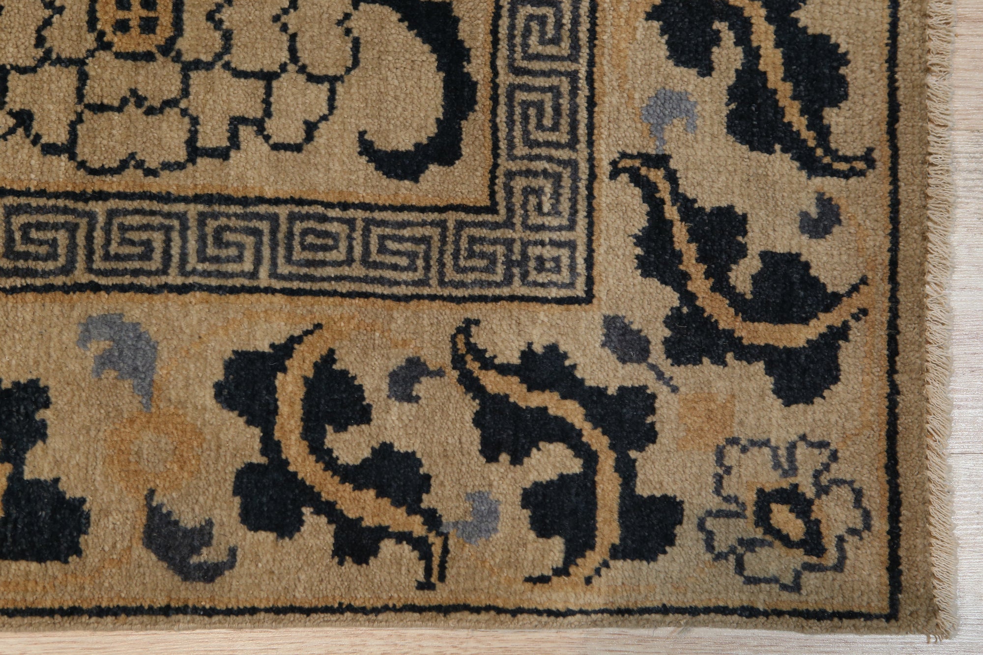 Willow Lydia Gold Hand Knotted Wool Rug, luxurious gold tones and intricate hand-knotted details enhance a living space with warmth and texture.