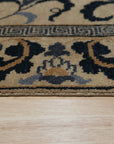 Willow Lydia Gold Hand Knotted Wool Rug, a luxurious gold wool rug hand-knotted with intricate patterns, adding warmth and sophistication to a living space.