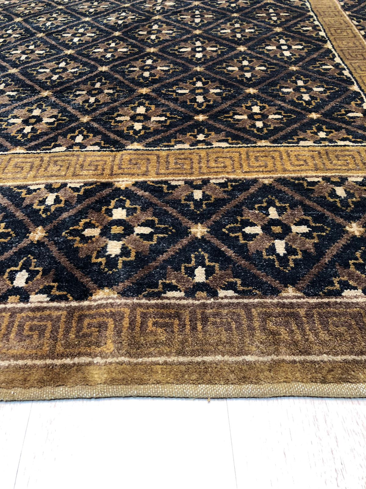 Bespoke Vibrant Brown Hand Knotted Wool Rug, showcasing a warm, inviting atmosphere. Earthy brown tones and intricate hand-knotted texture define this wool rug, lending depth and sophistication to the space.