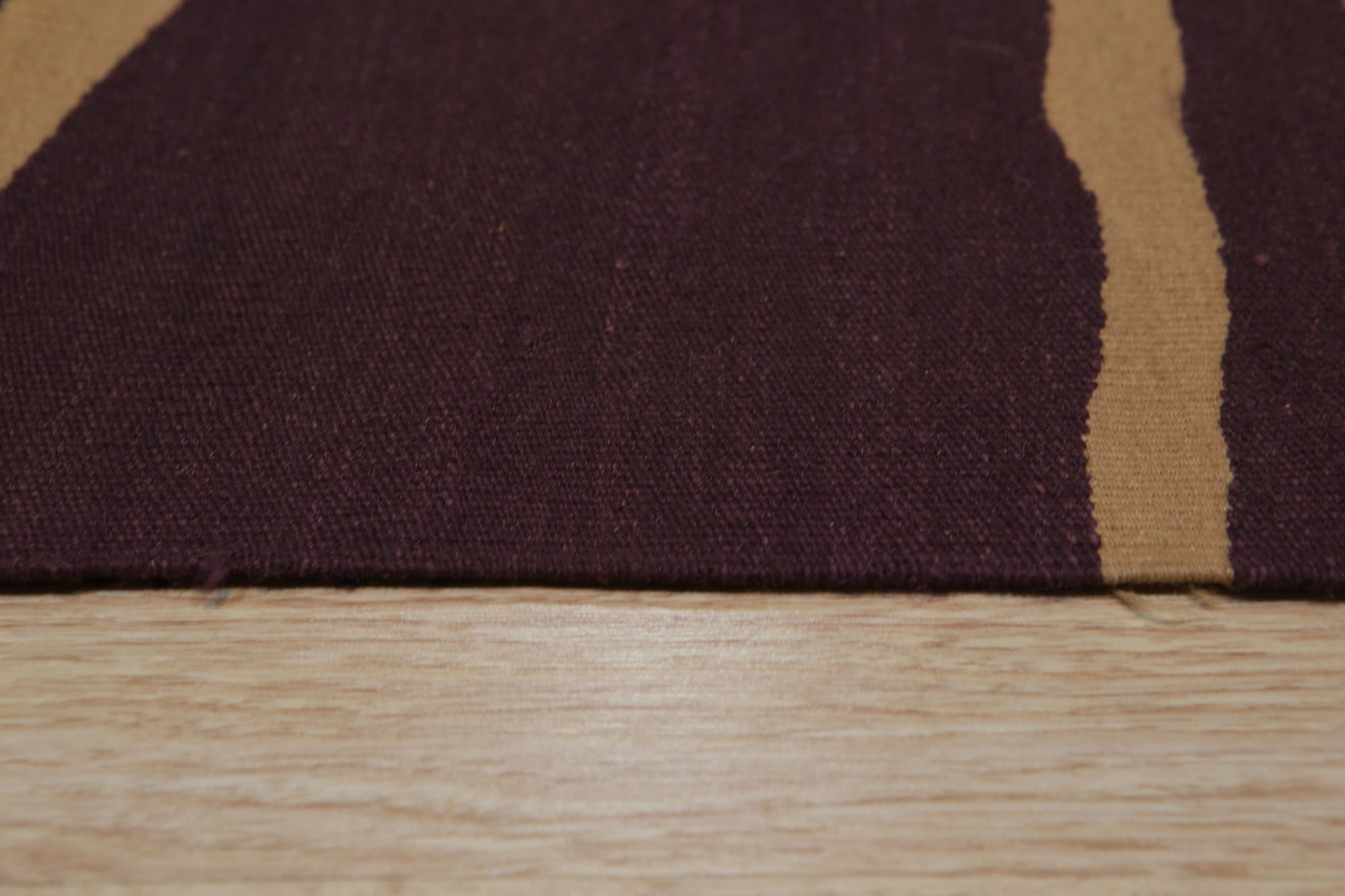 Stylish Iris Purple Flatweave Wool Rug, displaying a cool-toned iris purple hue with a flatweave construction, adding a touch of modern sophistication to a living space.