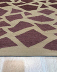 Vibrant Dazzling Pink Flatweave Wool Rug, a vivid pink wool rug featuring a geometric flatweave design, displayed in a brightly lit room with other furniture.