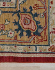 Enchanting Oushak Red Hand Knotted Wool Rug, a vibrant red wool rug featuring an intricate Oushak design, lies beautifully on a hardwood floor.
