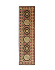 Giselle Violet Red Hand Knotted Wool Rug, a richly textured violet and red wool rug with intricate hand-knotted detailing, anchors a modern living space with neutral furnishings.