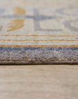 Giselle Exquisite Beige Hand Knotted Wool Rug, showcasing intricate beige patterns and textures, hand-knotted wool construction visible under bright studio lighting.