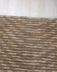 Sloane Freya Brown Hand Tufted Wool Rug, warm brown tones and subtle texture inviting touch, grounds a bright, modern living space with a woven depth.