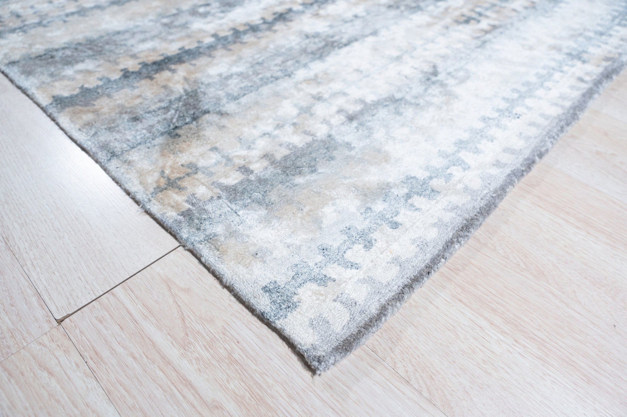 Selene Stylish Multicolored Hand Tufted Wool Rug, a vibrant explosion of color in a modern living space, its hand-tufted wool offering texture and warmth underfoot.
