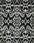 Isolated view of Luna Willow Black, White Hand Tufted Wool Rug, showcasing its abstract, flowing design.
