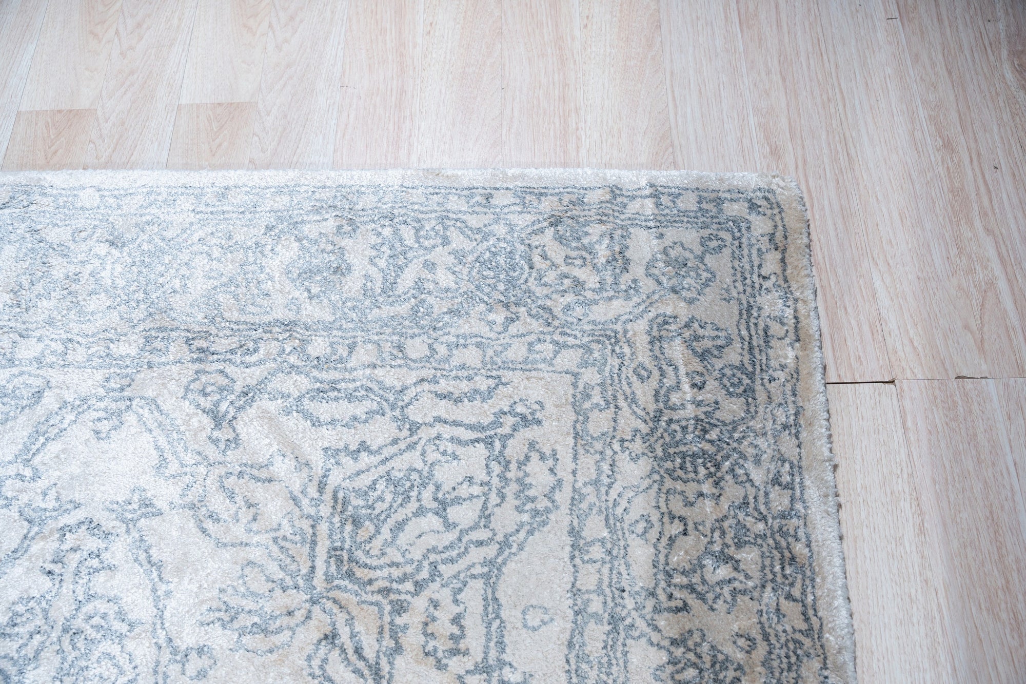 Warm Bespoke Beige Hand Tufted Wool Rug, its plush texture and subtle beige tones lending warmth to a modern living room setting.