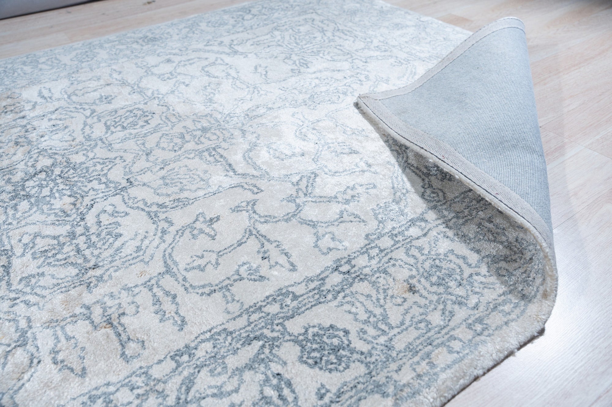 Warm Bespoke Beige Hand Tufted Wool Rug, its plush beige wool pile and subtle textures inviting comfort and warmth to the room, seen as part of a stylishly curated interior setting.