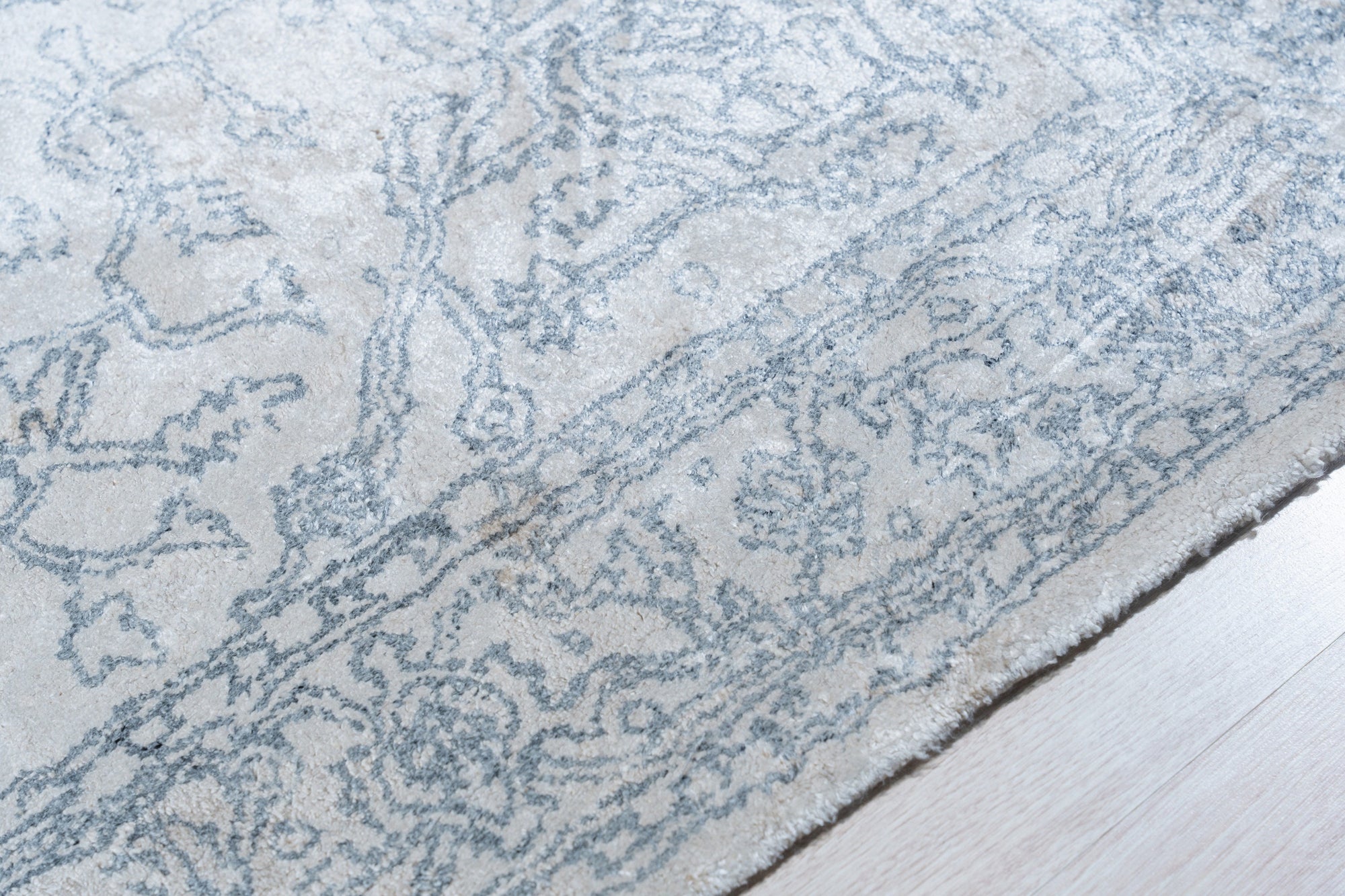 Warm Bespoke Beige Hand Tufted Wool Rug, its plush texture and subtle beige tones grounding a stylish living space, invites comfort and warmth.