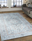 Fiona Vibrant Ivory Handmade Wool Rug, its creamy ivory tones and subtle textured weave softly illuminating a bright living room setting.