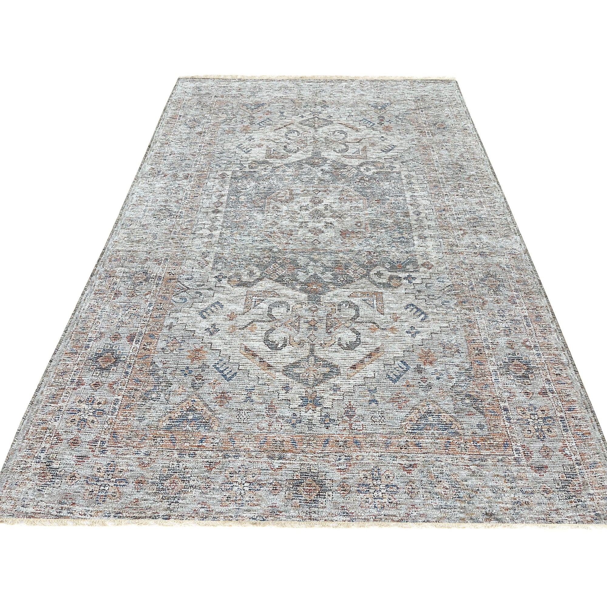 Fiona Vibrant Ivory Handmade Wool Rug, luxurious texture and soft ivory hues bring warmth to a sunlit living room; a handwoven masterpiece grounding the inviting space.