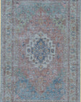 Isolated view of Refined Fiona Blue Handmade Wool Rug, showcasing its intricate, geometric pattern in varying shades of blue and cream.