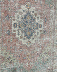 Refined Fiona Blue Handmade Wool Rug, showcasing deep blues and intricate, abstract patterns in a warm, inviting living space.