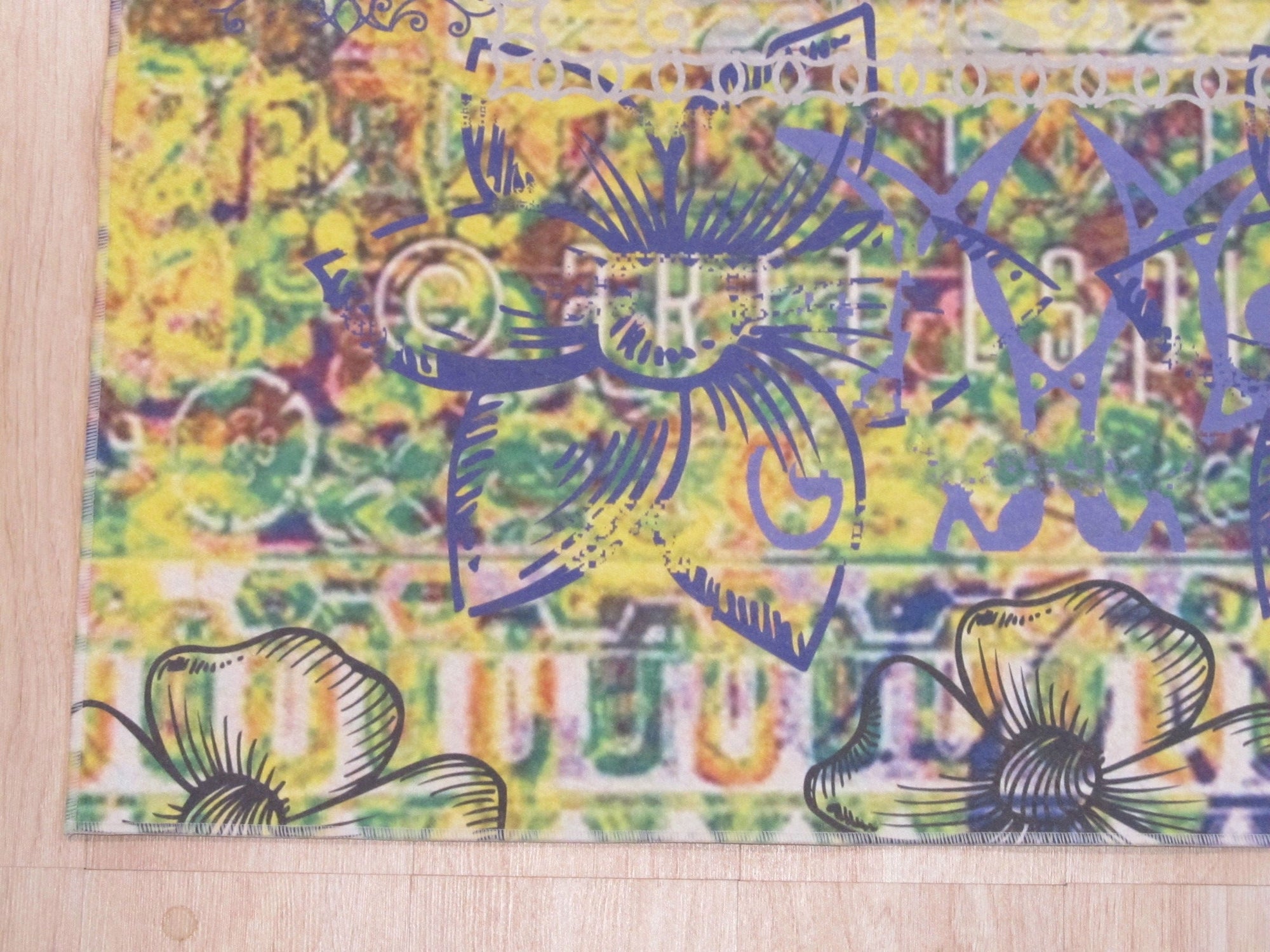 Xena Artistic Multicolor Machine Made Rug displayed in a bright, modern living room; vibrant splashes of blues, oranges, and yellows create an abstract pattern across the machine-made fibers, anchoring the seating area.