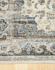 Sloane Chloe Ivory Machine Made Rug, its creamy ivory hues and subtle texture lending a serene and inviting ambiance to a brightly lit living space.