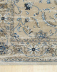 Elegant Lila Ivory Machine Made Rug displayed in a brightly lit living room, offering a soft, textured underfoot. Subtle lilac and ivory tones blend in a modern abstract pattern.