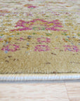 Sophisticated Majestic Ivory Machine Made Rug, draped elegantly in a bright, inviting space, showcasing its intricate ivory patterns and machine-made texture, blending seamlessly with modern furniture.