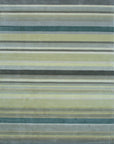 Zinnia Striped Green Handmade Wool Rug, showcasing its design with vibrant green stripes alternating with natural wool tones.