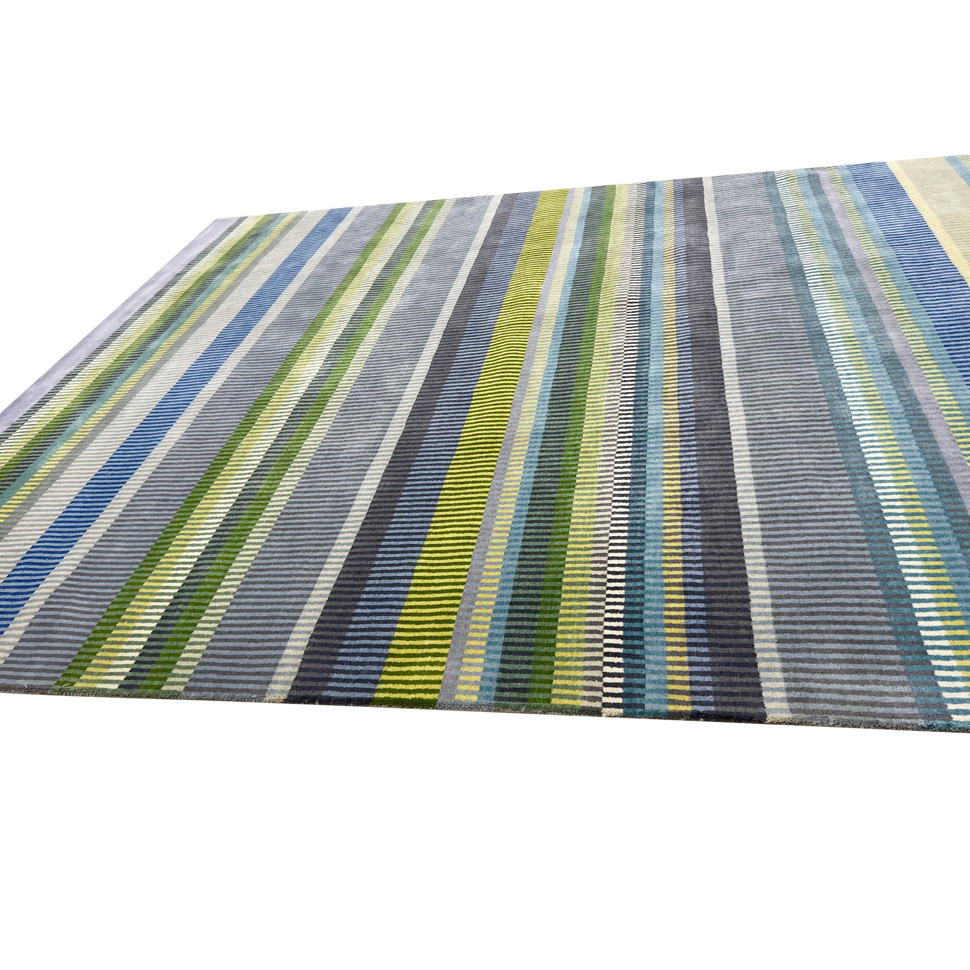 Serene Xena Green Handmade Wool Rug, showcasing textured, hand-knotted wool in various shades of green, with a subtle, organic pattern and a soft, inviting feel.