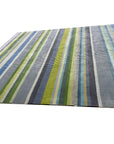 Serene Xena Green Handmade Wool Rug, showcasing textured, hand-knotted wool in various shades of green, with a subtle, organic pattern and a soft, inviting feel.