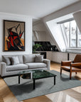 Delicate Giselle Gray Handmade Wool Rug, showcasing its soft gray hues and intricate pattern in a living room setting.