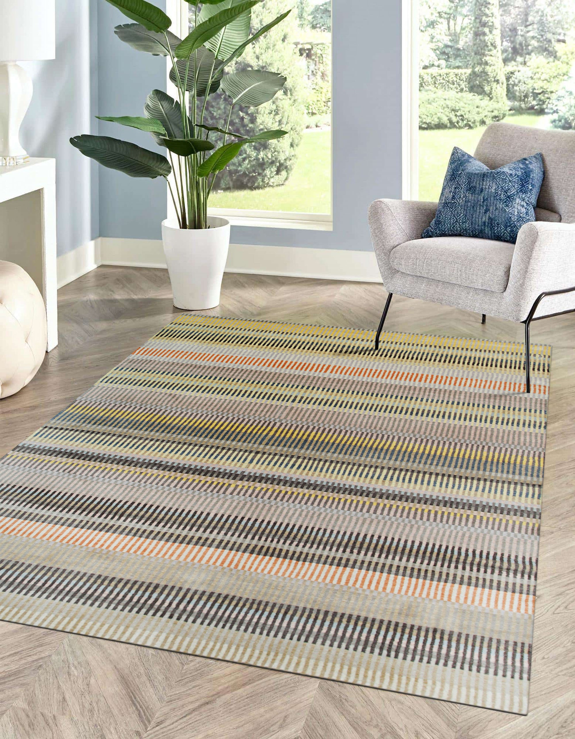 Louie Ophelia Beige Handmade Wool Rug, subtle geometric patterns dance across a soft beige field, hand-knotted wool offering both warmth and refined texture in a living room setting.