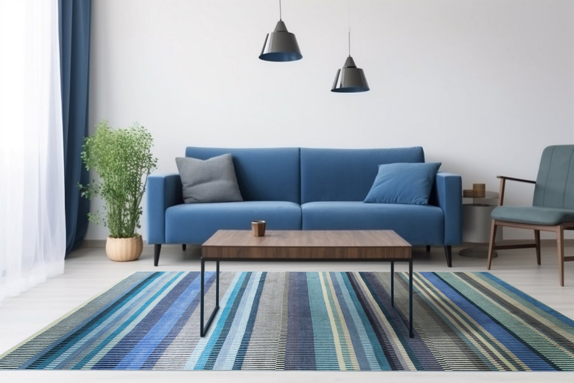 Louie Ophelia Ocean Blue Handmade Wool Rug, washes of deep ocean blue and lighter azure blend across a textured, hand-tufted wool surface, creating a calming, watery ambiance within a softly lit room.