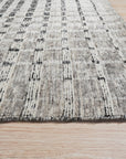 Nadia Ava Gray Handmade Wool Rug, soft gray hues and subtle texture blend seamlessly into a contemporary living room setting, highlighting its handmade wool construction.
