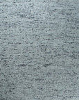 Isolated view of Opulent Alluring Dark Gray Handmade Wool Rug, showcasing its dense pile and subtle, swirling texture.