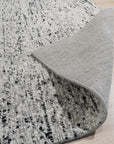 Opulent Alluring Dark Gray Handmade Wool Rug, a rich dark gray wool rug with subtle texture, grounding a contemporary living space.