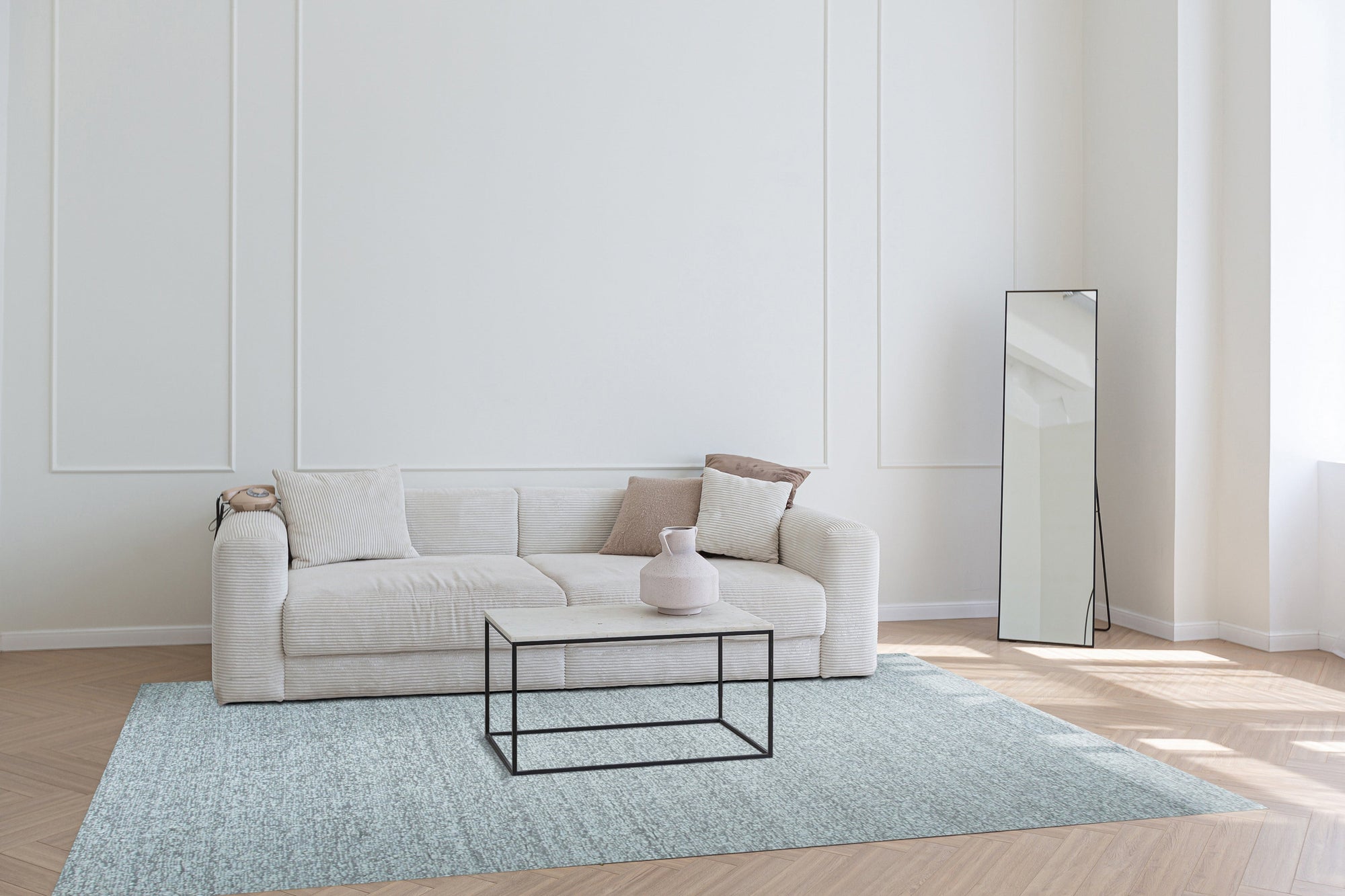 Opulent Alluring Silver Handmade Wool Rug, its shimmering silver tones and intricate hand-knotted details blending seamlessly into a modern living room setting.