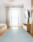 Opulent Alluring Silver Handmade Wool Rug, its plush silver wool pile gleams under soft light, showcasing intricate knotting and a subtle, elegant pattern.