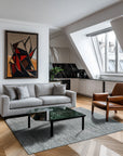 Tessa Maya Gray Hand Knotted Wool Rug, a soft gray wool rug with subtle variations in tone, anchors a light-filled living room.
