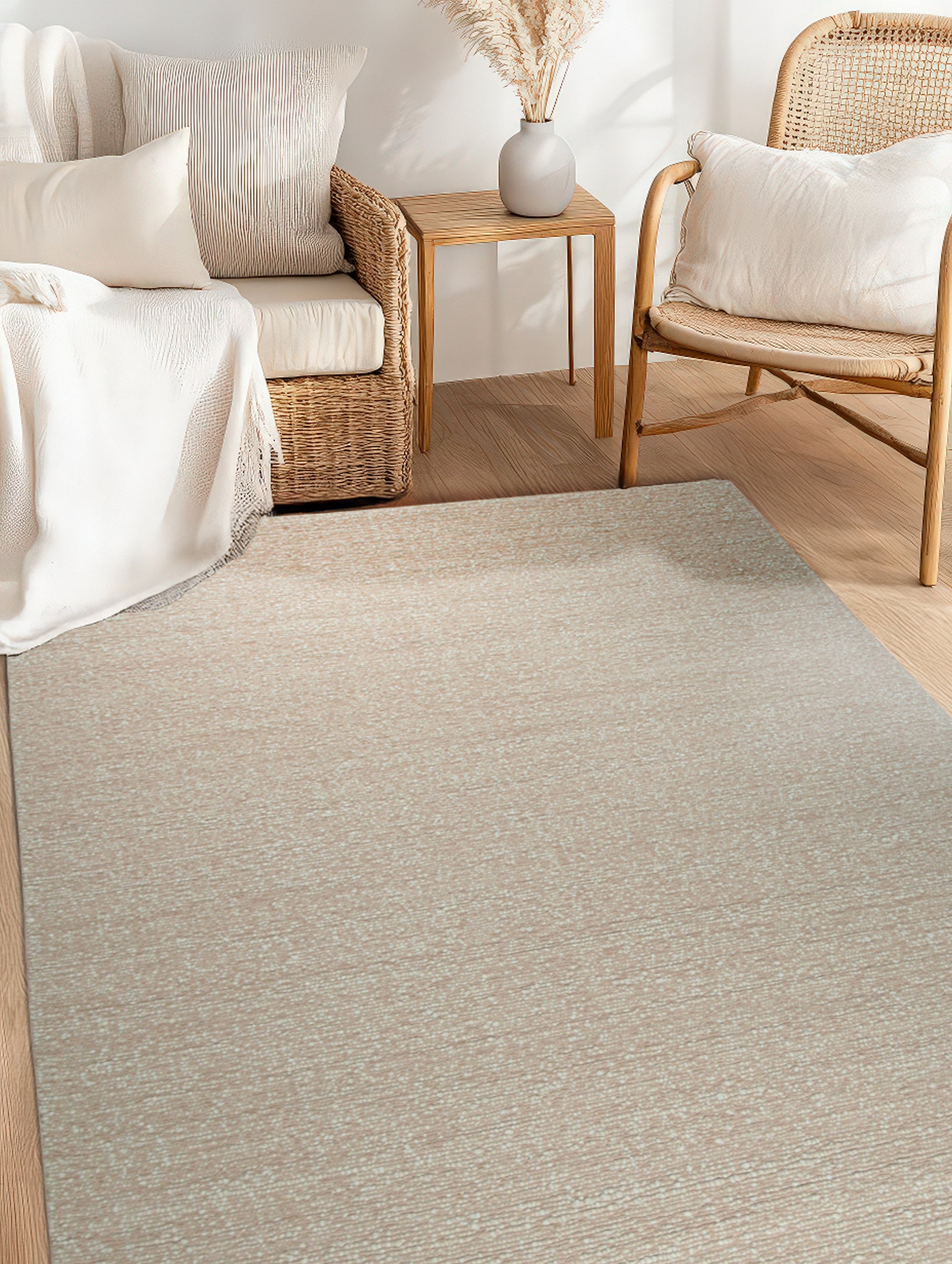 Freya Graceful Pink Handmade Wool Rug, a soft pink wool rug with subtle, flowing design, lending a touch of understated elegance to a bright, airy living space.