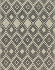 Isolated view of Luna Kilim Black Handmade Wool Rug, displaying its geometric kilim pattern with contrasting light and dark tones.