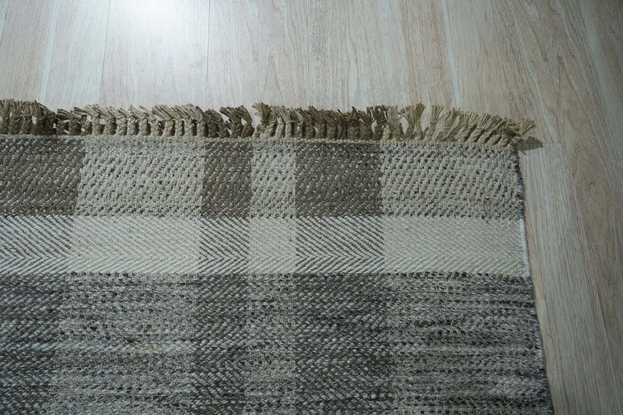 Giselle Serene Multicolor Flatweave Wool Rug, showing a vibrant blend of blues, greens, yellows, and reds in a flatweave wool construction, its abstract, painterly design enriching a light-filled living space.