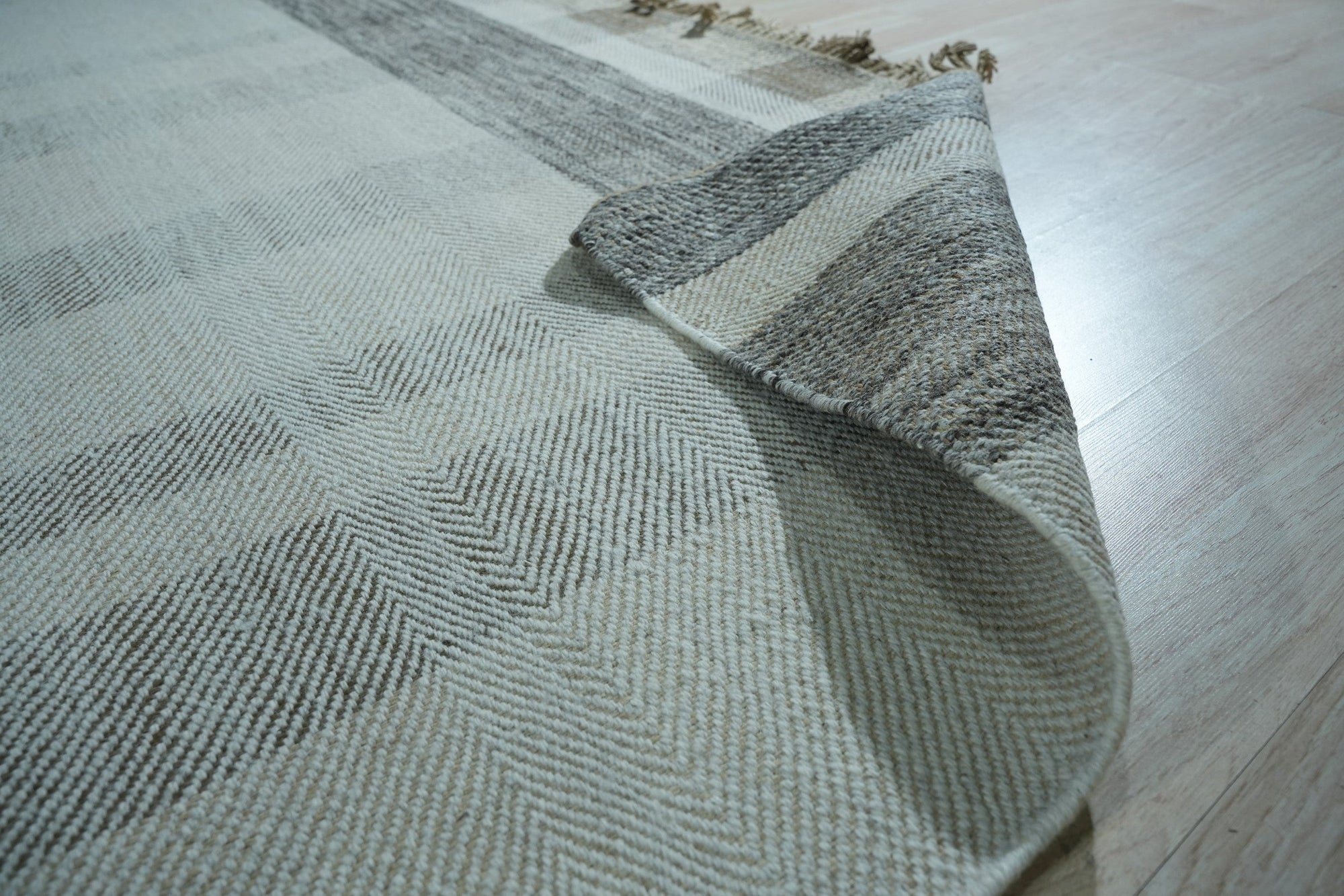 Giselle Serene Multicolor Flatweave Wool Rug, a vibrant blend of hues in a flatweave wool construction, shown in a living room setting with coordinating furniture.