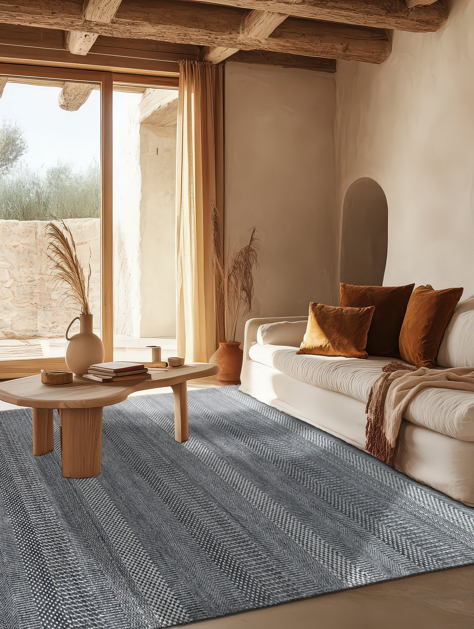 Dazzling Chic Gray Hand Knotted Wool & Viscose Rug, featuring subtle sheen and intricate knotting, displayed on a light wood floor with natural lighting highlighting its texture.