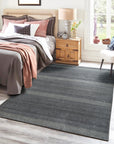 Dazzling Chic Gray Hand Knotted Wool & Viscose Rug, a gray wool and viscose rug featuring a subtle, shimmering design, seen in a bright living space enhancing the modern aesthetic.
