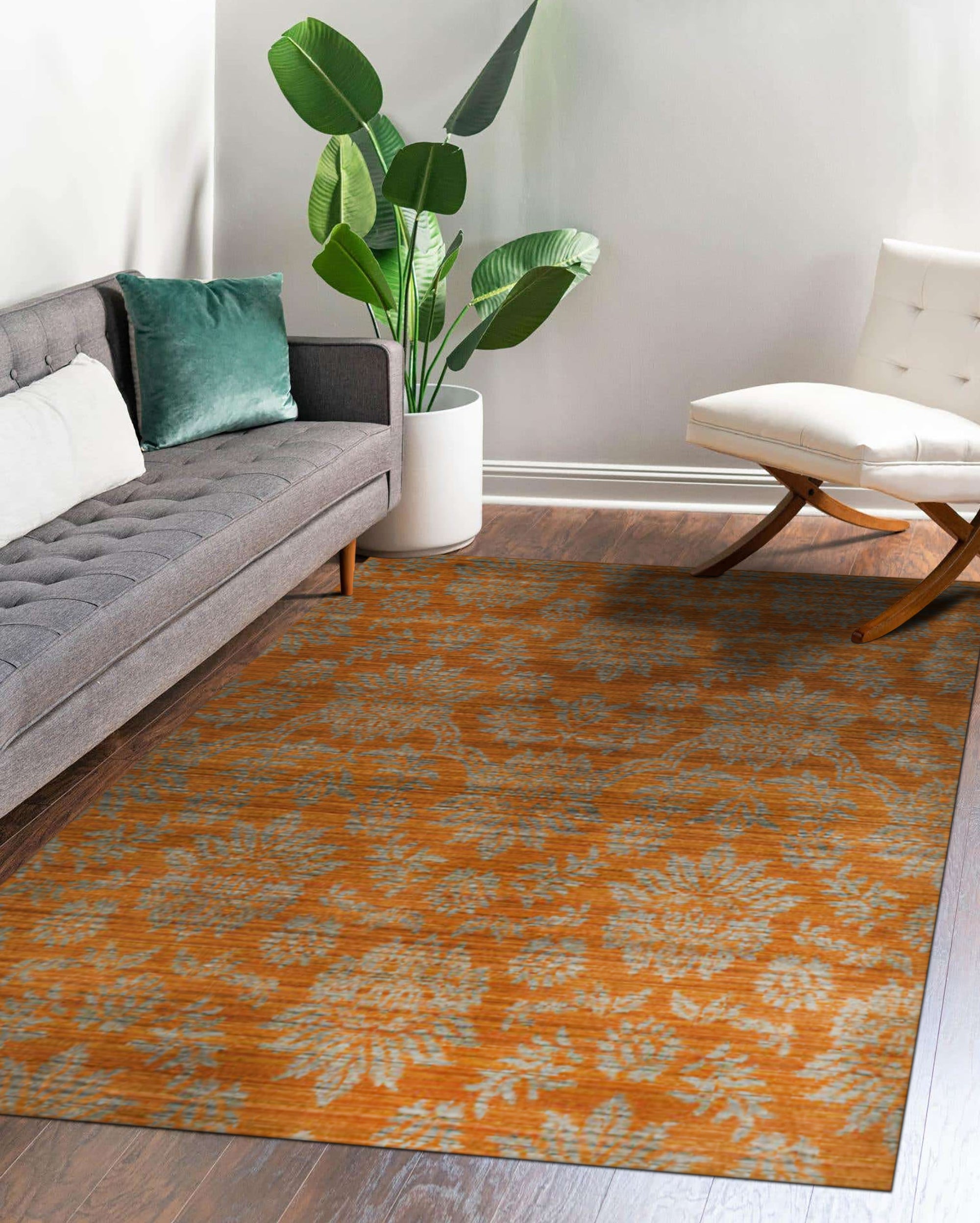 Ruby Inviting Brown Machine Made Wool Rug, displaying a textured, earthy brown palette and intricate geometric patterns, filling a contemporary living room setting.