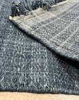 Delicate Elena Blue Flatweave Wool Rug, a calming blue wool rug with a subtle, textured flatweave design, adding warmth to a modern living space.