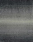 Isolated view of Modern Talia Gray Handmade Wool Rug, showcasing its gray and cream geometric pattern with subtle variations in texture across its hand-knotted wool surface.