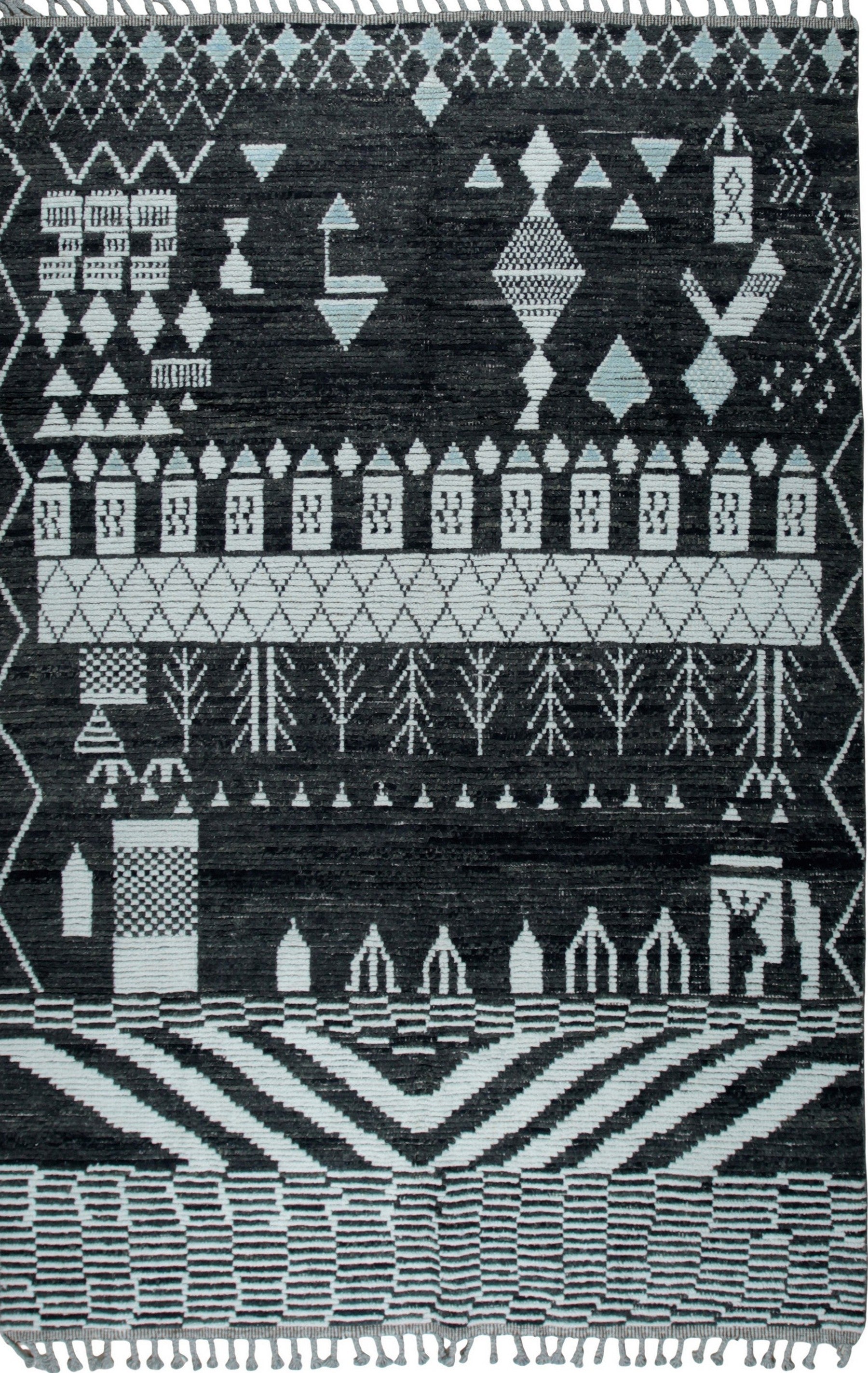 Isolated view of Marrakech Essence Black Rug, showcasing its intricate, geometric design with varying pile heights that create a textured, three-dimensional effect in shades of black and cream.