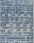 Isolated view of Elegant Marrakech Blue Hand-Knotted Wool Rug, showcasing its intricate geometric design and rich blue hues.