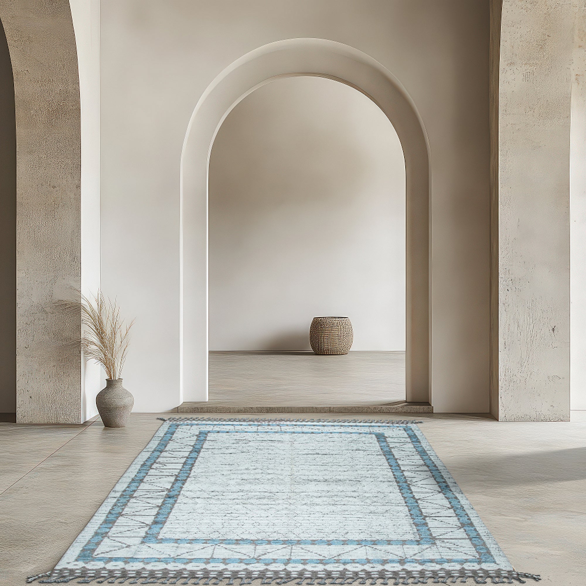 Timeless Marrakech Ivory Hand-Knotted Wool Rug displayed in a bright, modern living room, its intricate geometric design adding warmth to the minimalist space.