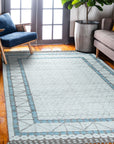 Timeless Marrakech Ivory Hand-Knotted Wool Rug, featuring a subtle geometric pattern in ivory tones, adding warmth and texture to a neutral living space.